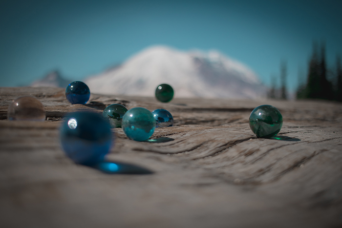 Photo of marbles and mountain
